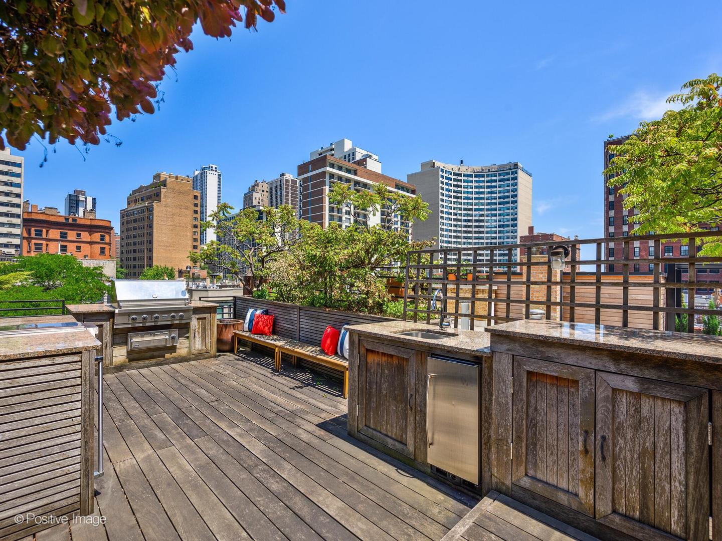 37 East Elm Street Chicago, IL 60611 - Photo 26 of 32 a view of city from balcony with seating space
