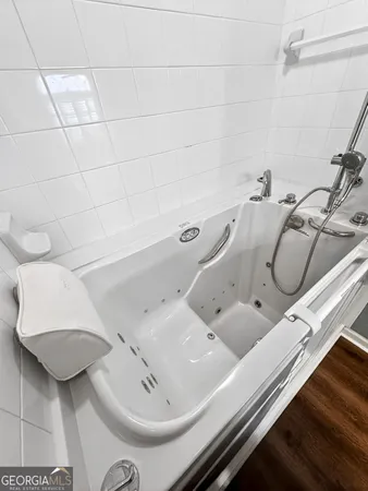 a bathroom with a sink and mirror