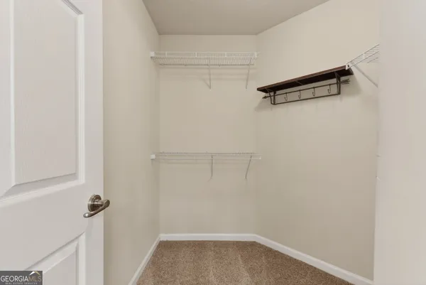 a view of small space with racks on the wall