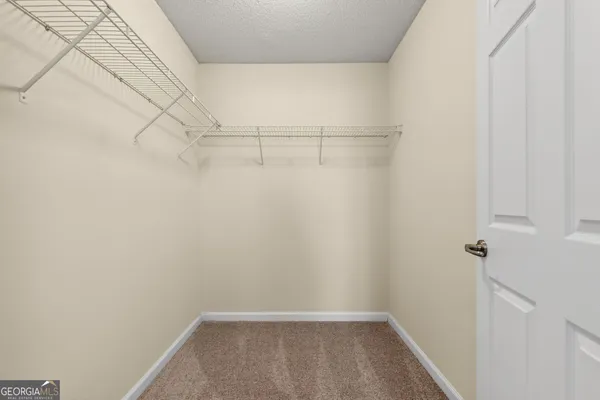 a view of a room with racks on the wall