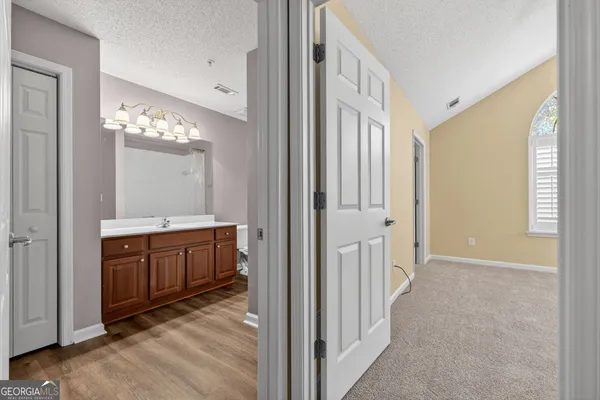 a view of a hallway with front door