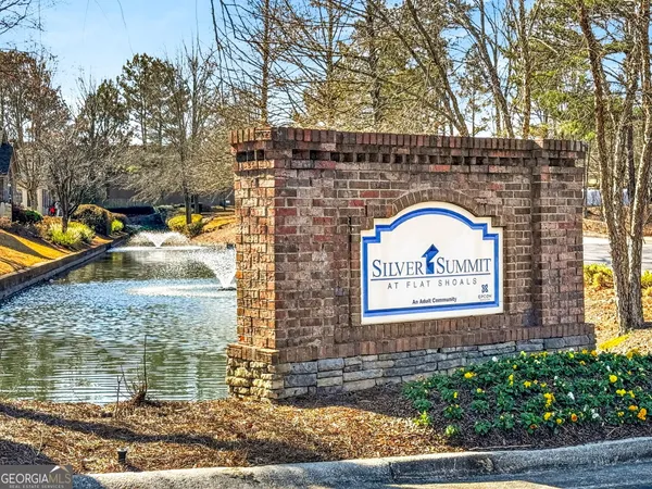 a view of entrance gate of a house
