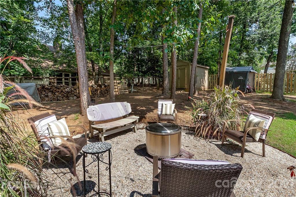 5063 Suwarrow Circle Tega Cay, SC 29708 - Photo 18 of 18 a view of a table and chairs in the patio