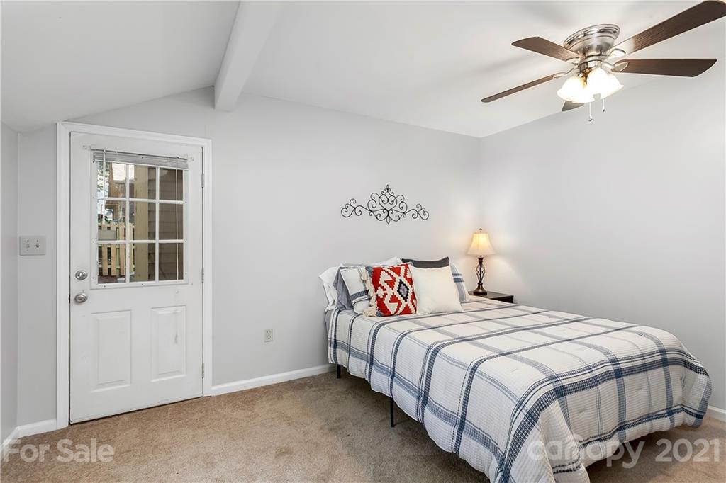 5063 Suwarrow Circle Tega Cay, SC 29708 - Photo 10 of 18 a bedroom with a bed and a window