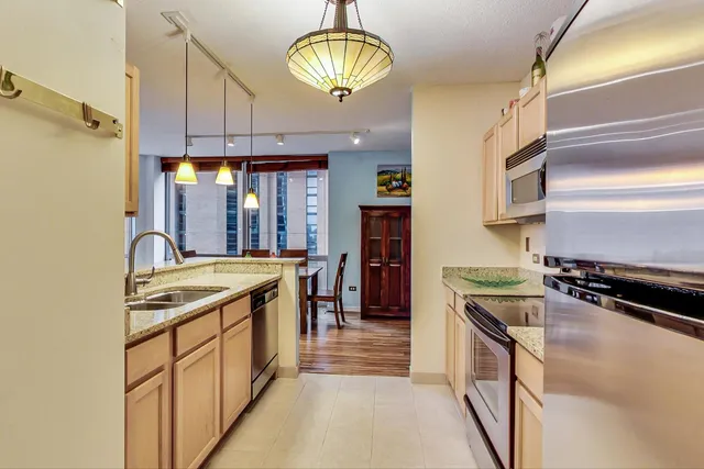 a room with a bed and a flat screen tv