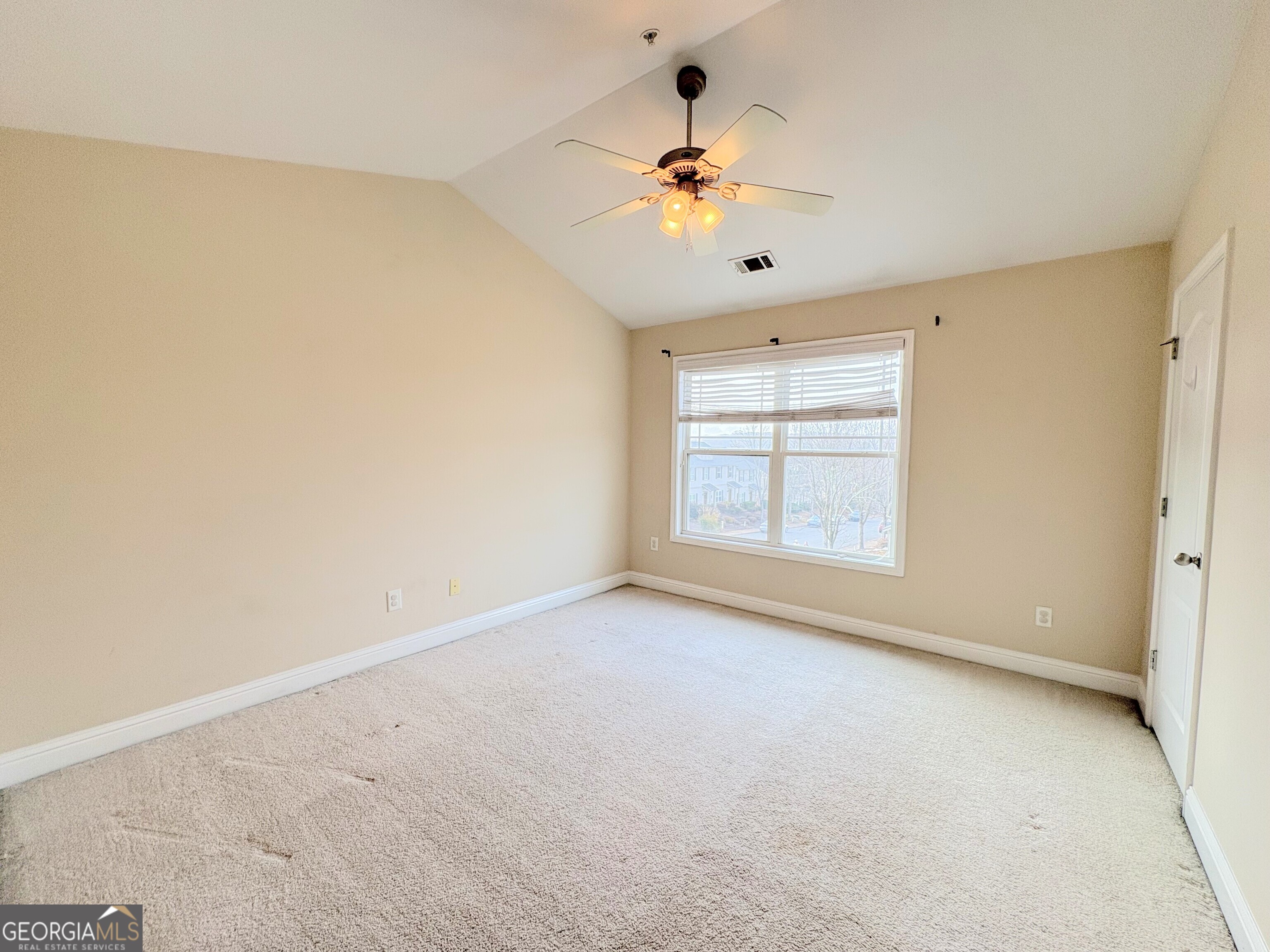 135 Oconee River Circle Athens, GA 30605 - Photo 11 of 17 a view of an empty room with a window
