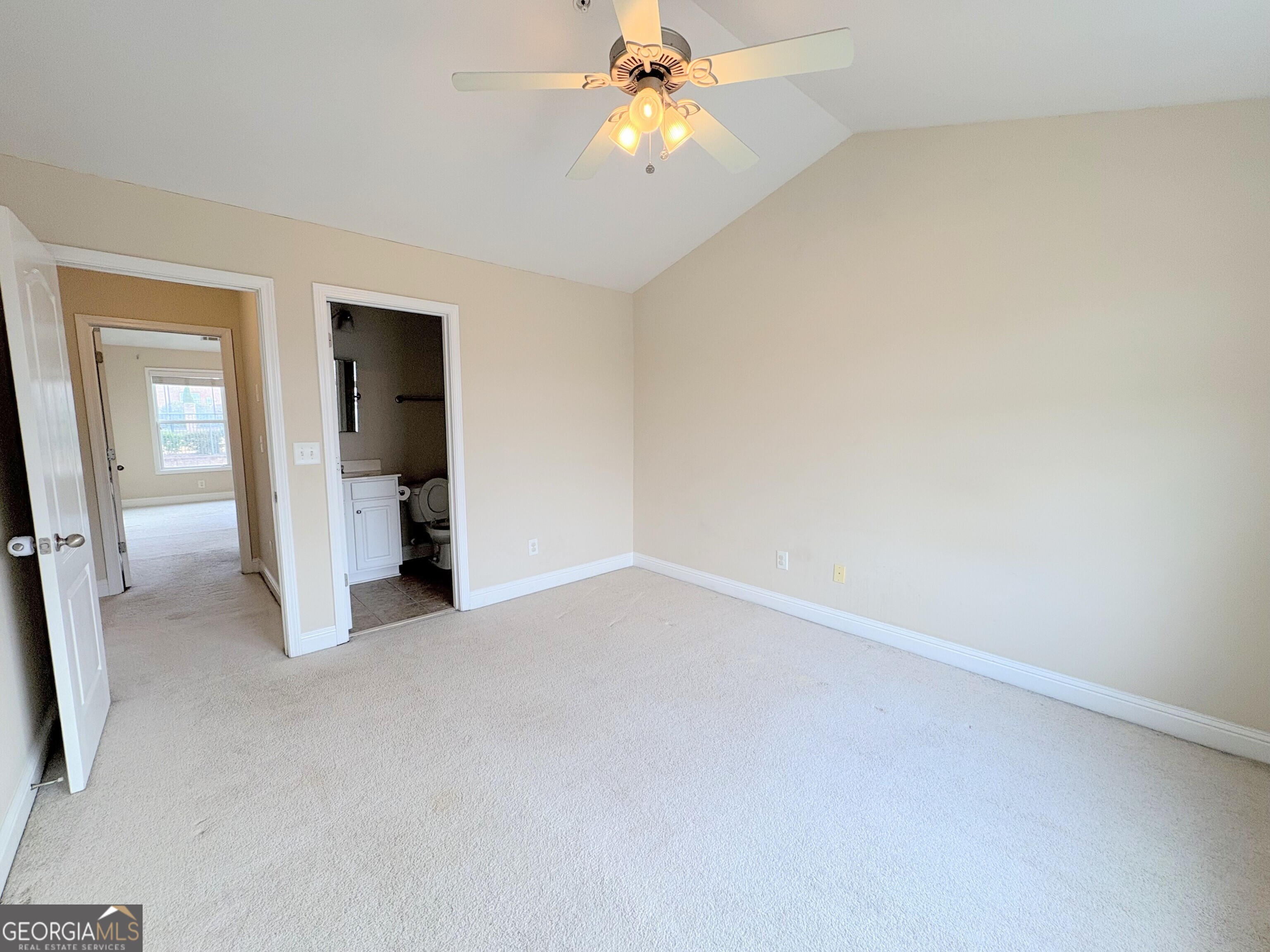 135 Oconee River Circle Athens, GA 30605 - Photo 12 of 17 an empty room with closet and a chandelier fan