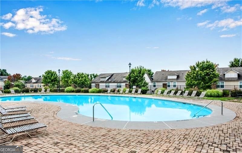 135 Oconee River Circle Athens, GA 30605 - Photo 17 of 17 a view of a swimming pool with a yard