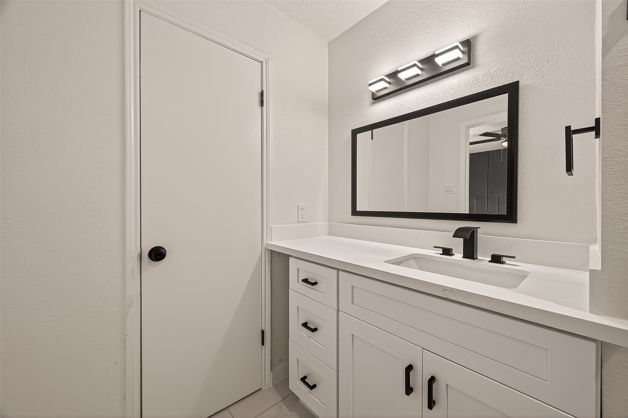 4415 Anacacho Street Pasadena, TX 77504 - Photo 34 of 45 a bathroom with a double vanity sink mirror and