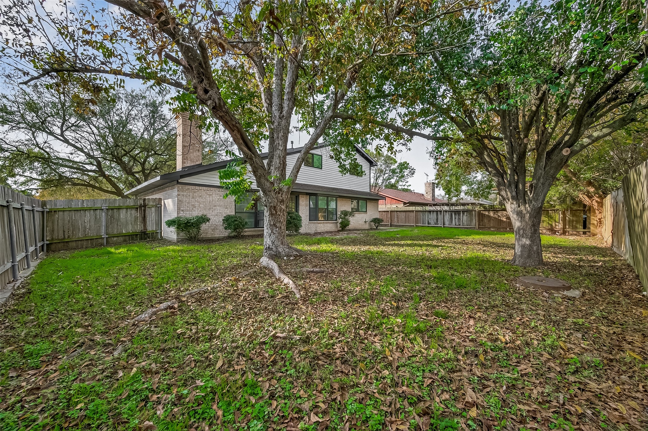 4415 Anacacho Street Pasadena, TX 77504 - Photo 40 of 45 a house view with a garden space