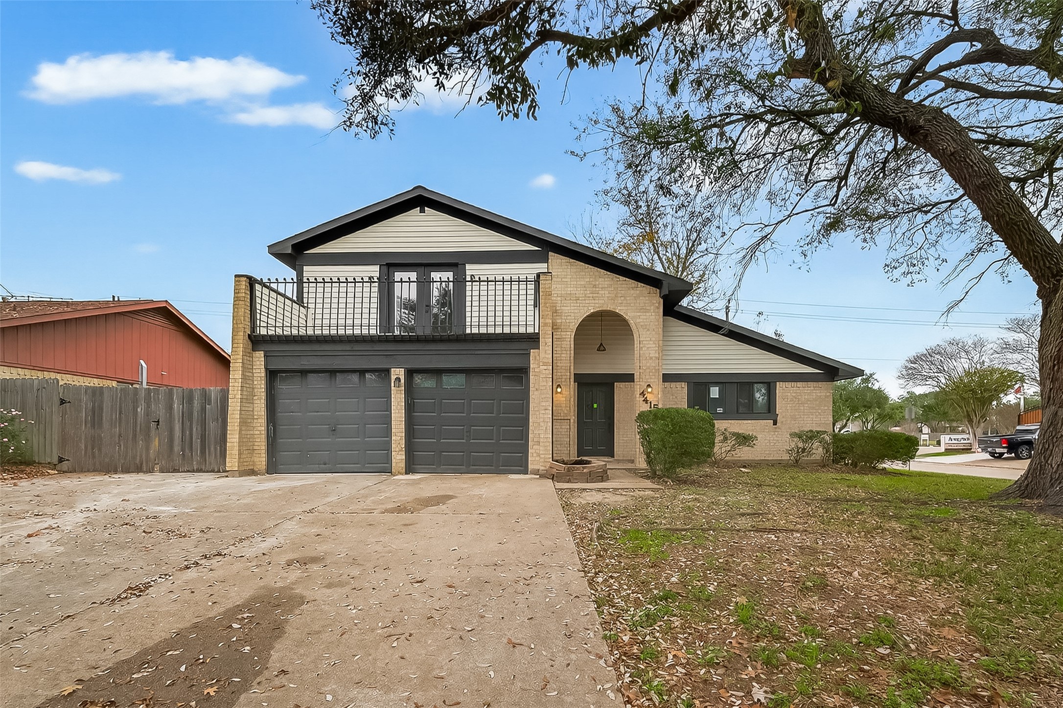 4415 Anacacho Street Pasadena, TX 77504 - Photo 4 of 45 a front view of a house with a yard and garage