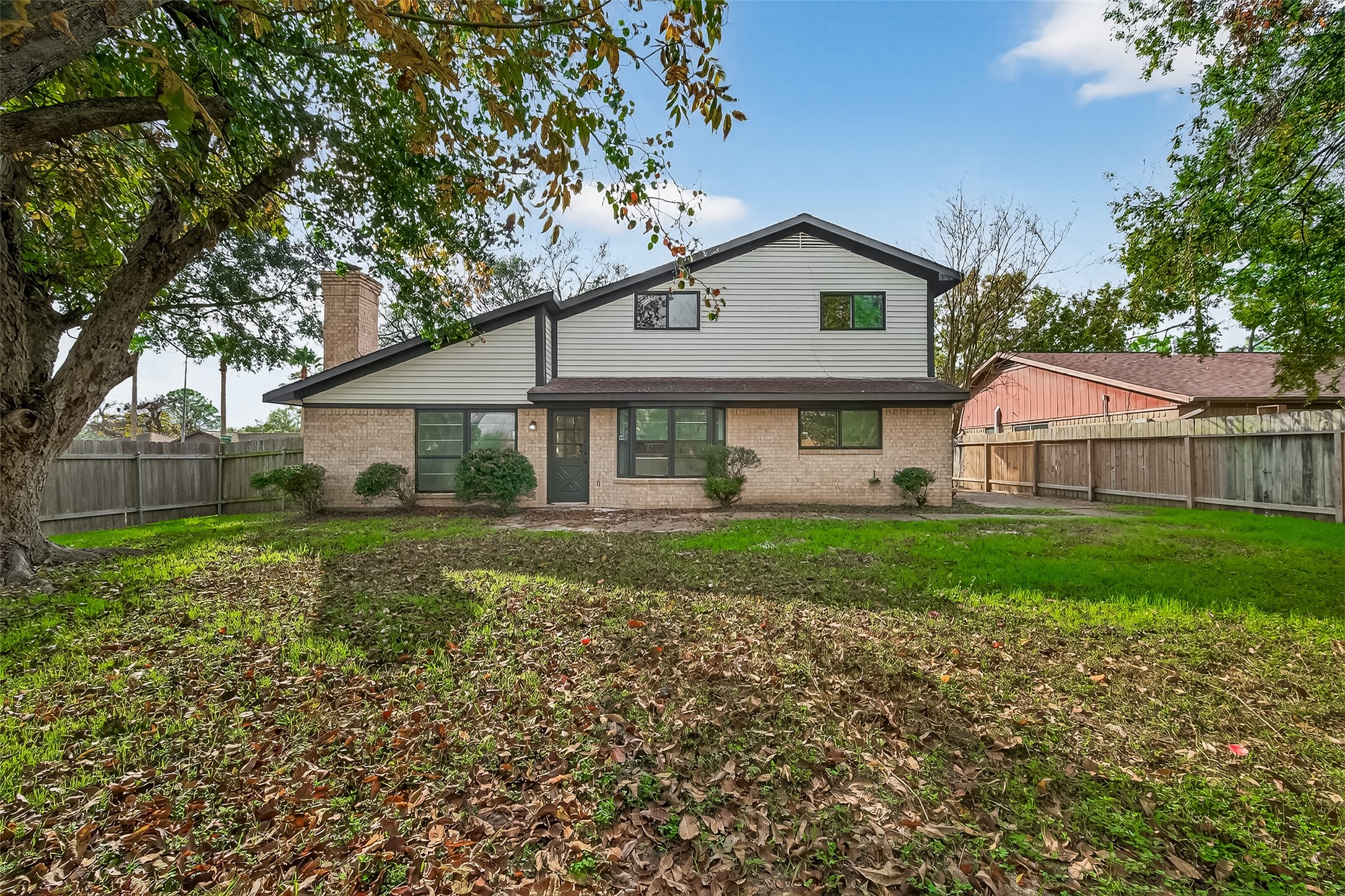 4415 Anacacho Street Pasadena, TX 77504 - Photo 41 of 45 a view of a house with yard and a garden