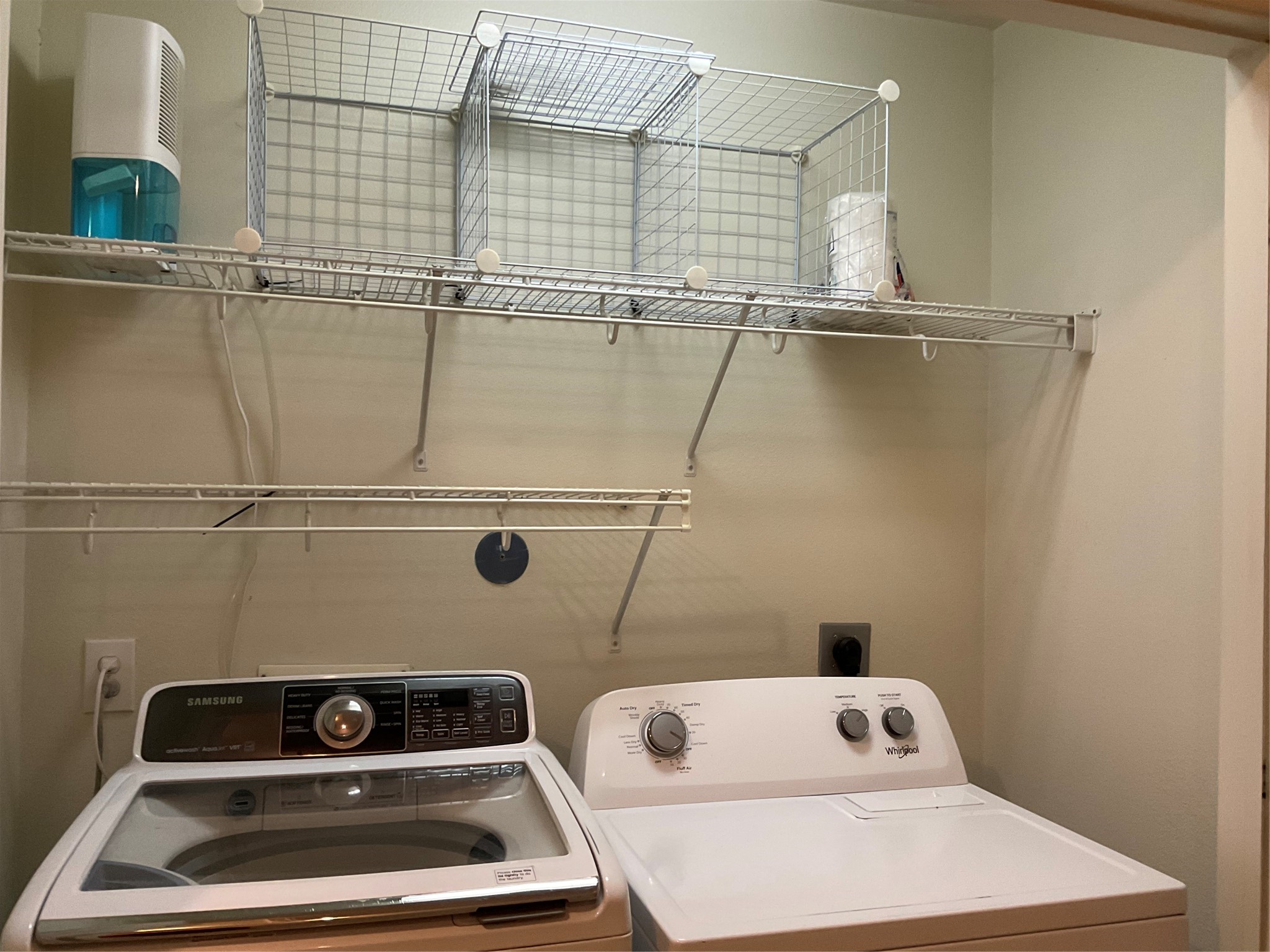 2110 Rustling Trees Way Spring, TX 77373 - Photo 26 of 36 Additional shelves above the washer and dryer.