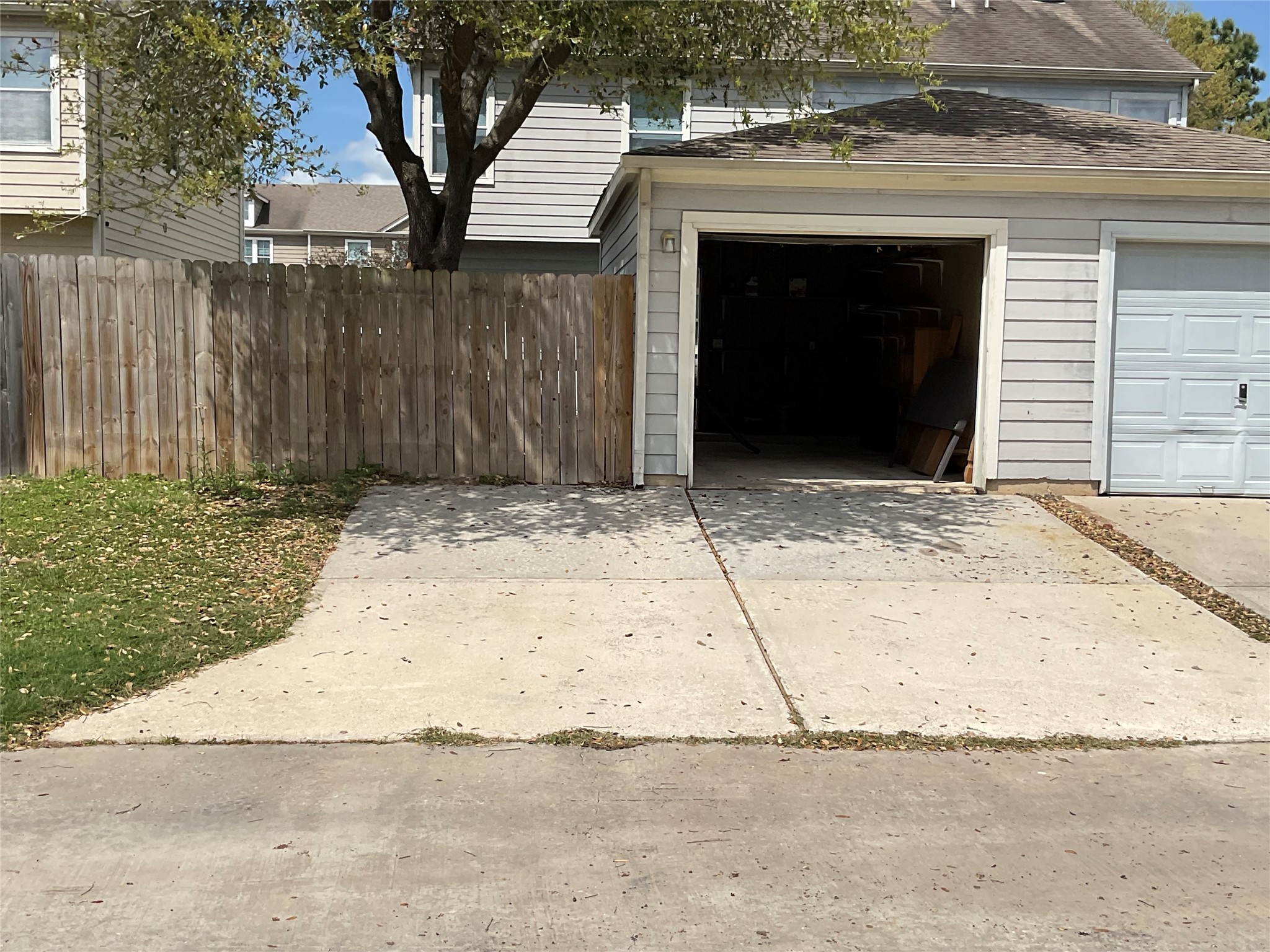 2110 Rustling Trees Way Spring, TX 77373 - Photo 32 of 36 2 Private parking spaces off the alleyway. Also view of the 1 car private garage.