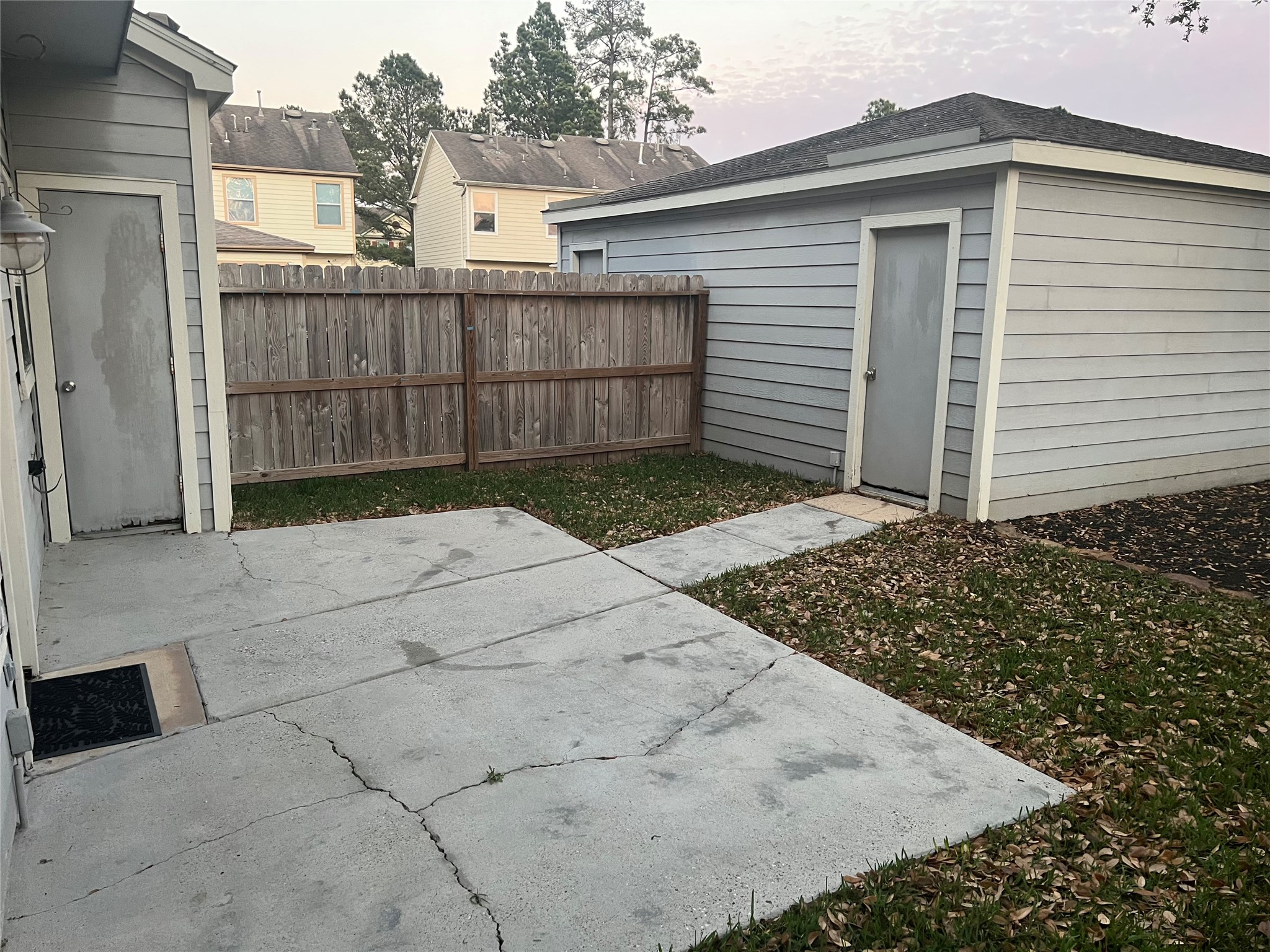 2110 Rustling Trees Way Spring, TX 77373 - Photo 34 of 36 Back patio with walk way to the garage.