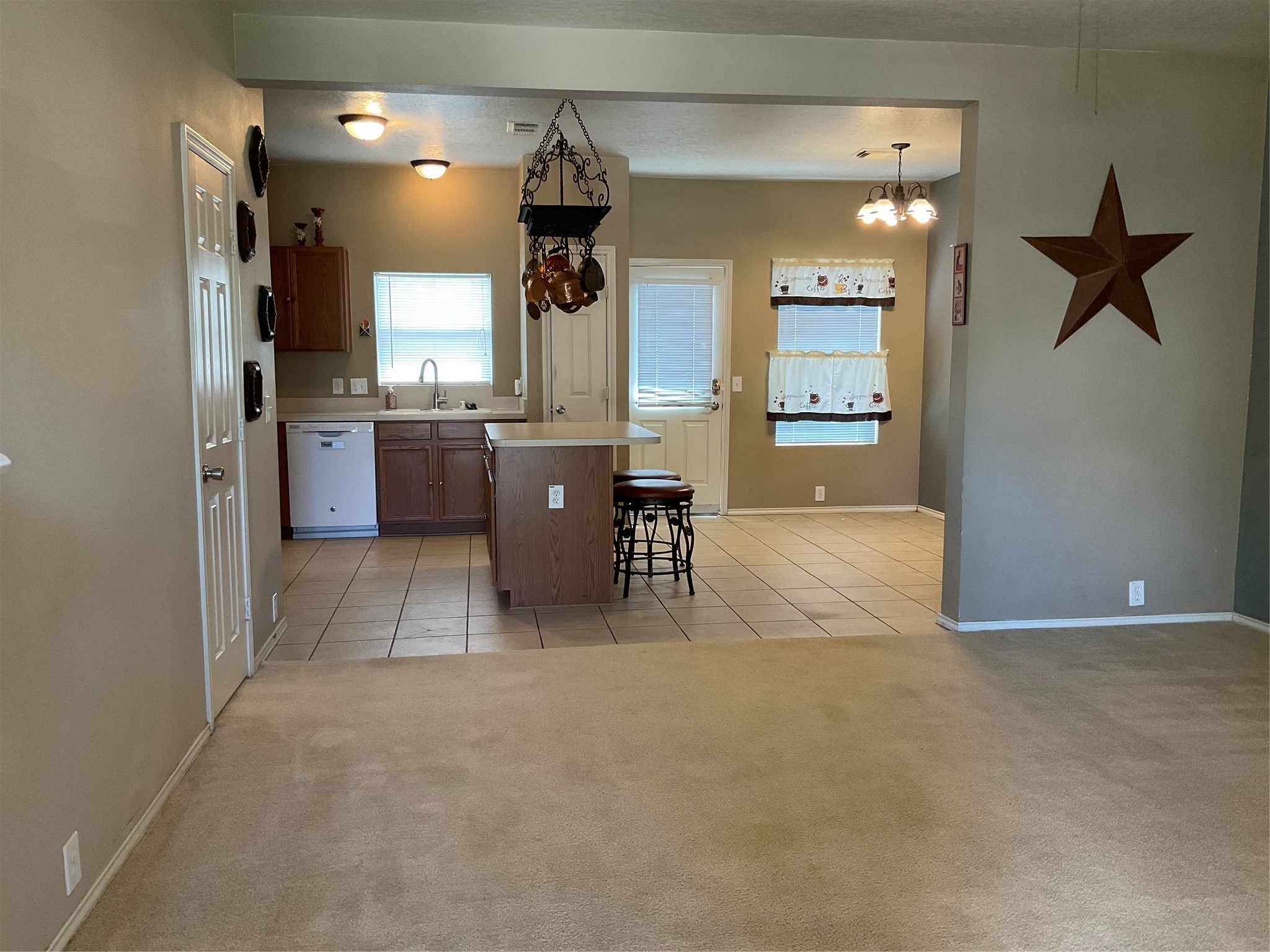 2110 Rustling Trees Way Spring, TX 77373 - Photo 9 of 36 View from the front door into the kitchen and dining room