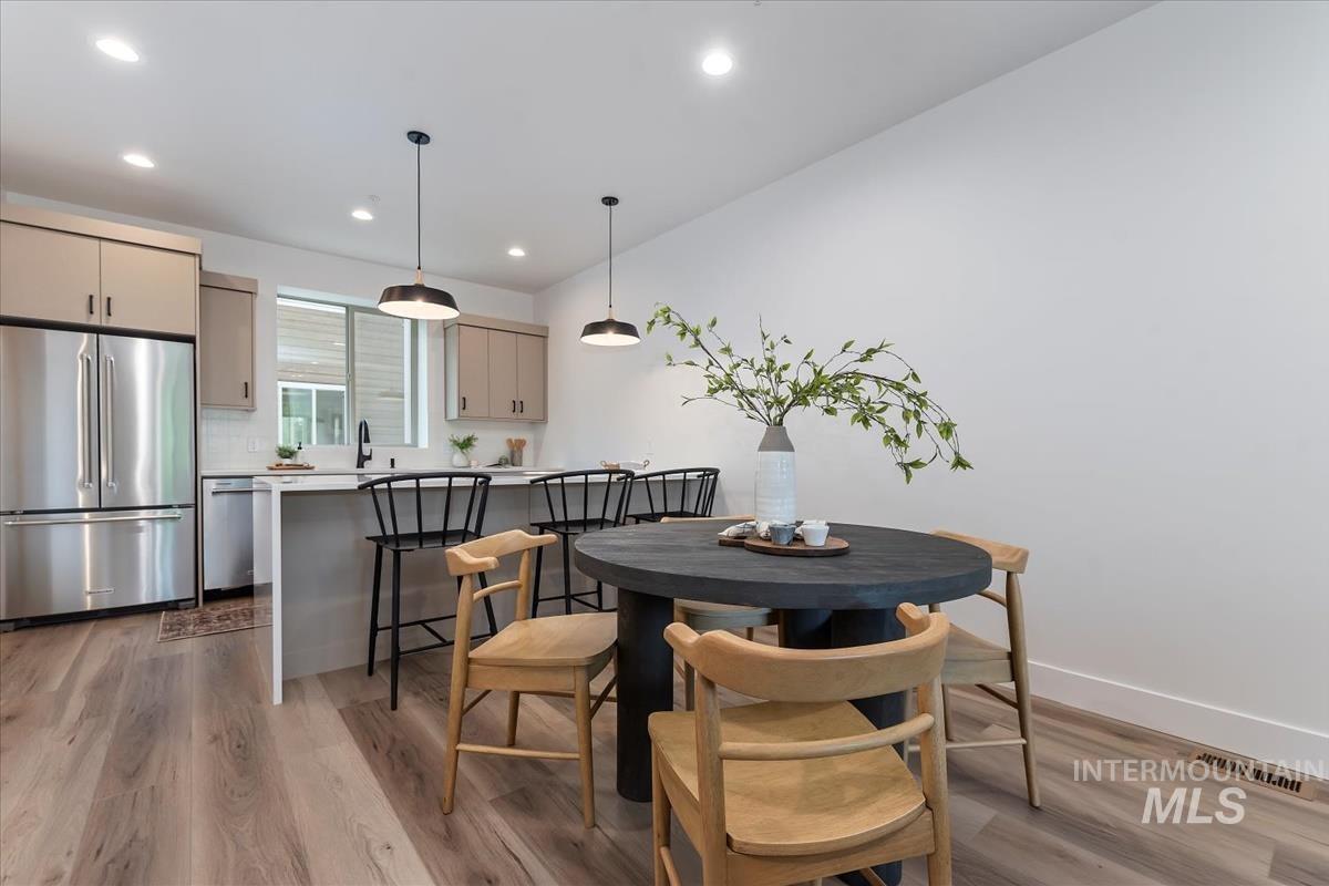 1705 South Federal Way Boise, ID 83705 - Photo 13 of 34 Dining area featuring light wood-style floors and recessed lighting