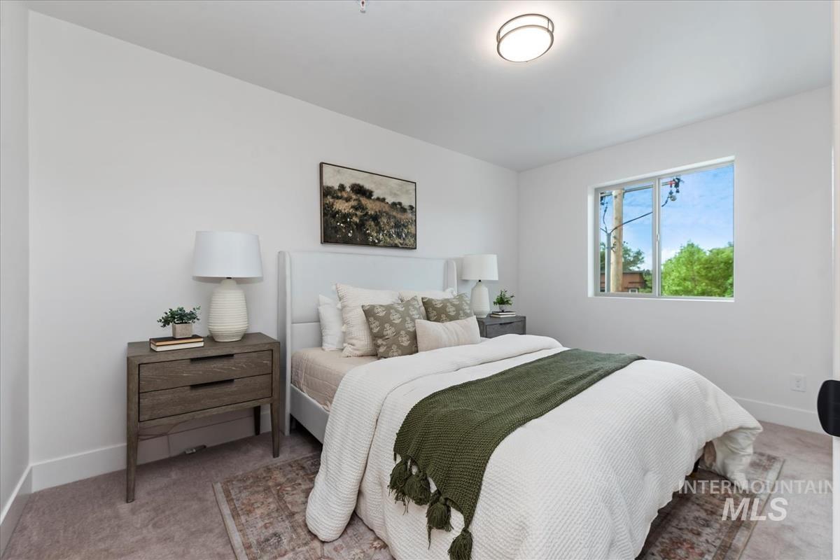 1705 South Federal Way Boise, ID 83705 - Photo 28 of 34 Bedroom featuring carpet floors and baseboards