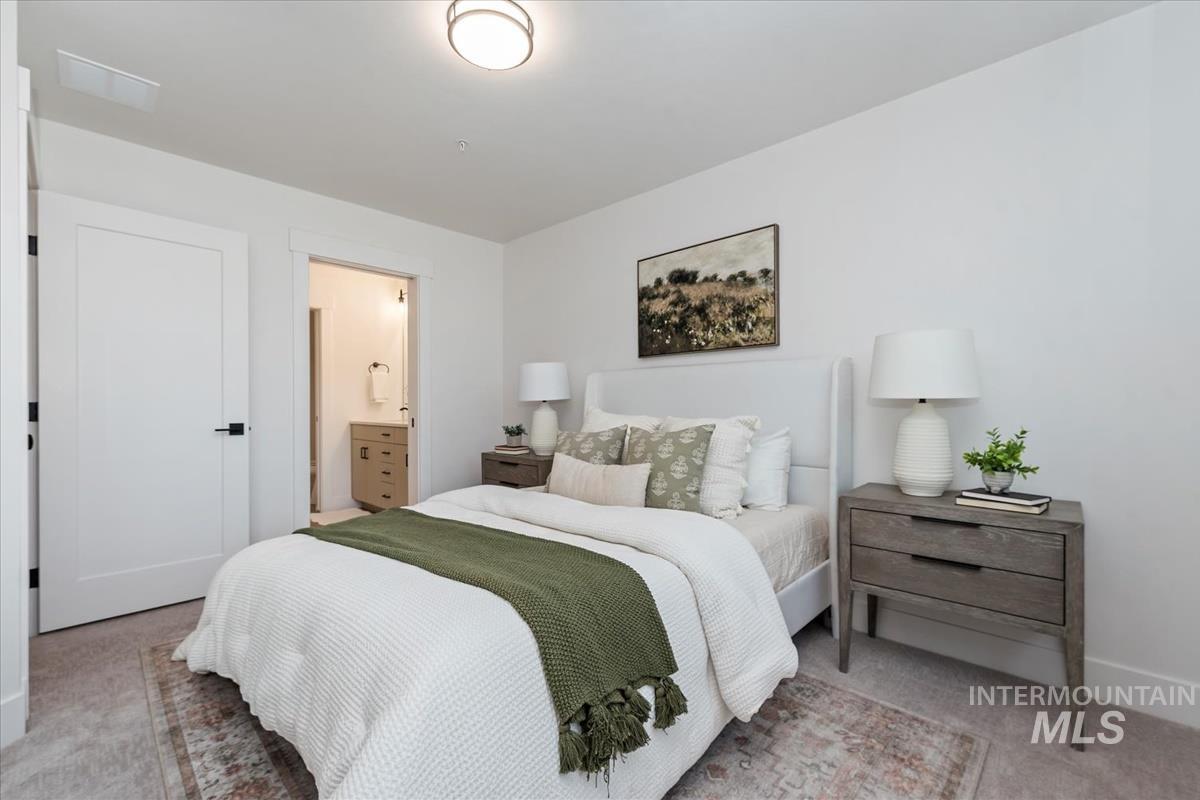 1705 South Federal Way Boise, ID 83705 - Photo 29 of 34 Bedroom featuring carpet and ensuite bath