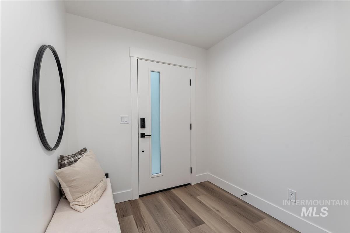 1705 South Federal Way Boise, ID 83705 - Photo 3 of 34 Entrance foyer with light wood finished floors and baseboards