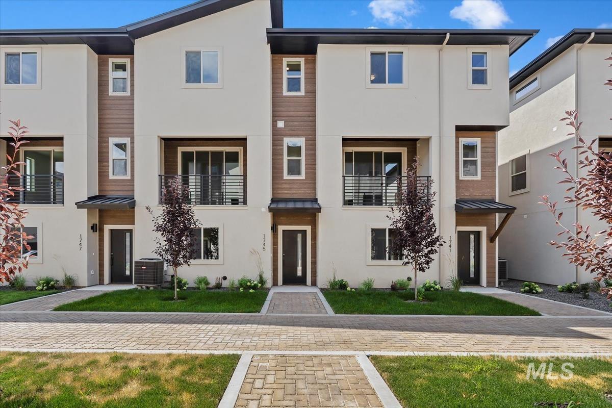 1705 South Federal Way Boise, ID 83705 - Photo 33 of 34 Modern home featuring stucco siding, a metal roof, a standing seam roof, and a balcony