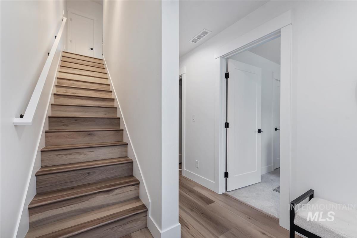 1705 South Federal Way Boise, ID 83705 - Photo 8 of 34 Stairs with wood finished floors and baseboards