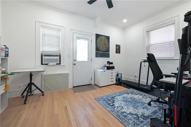 a workspace with furniture and window