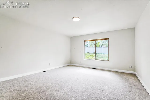 an empty room with a window