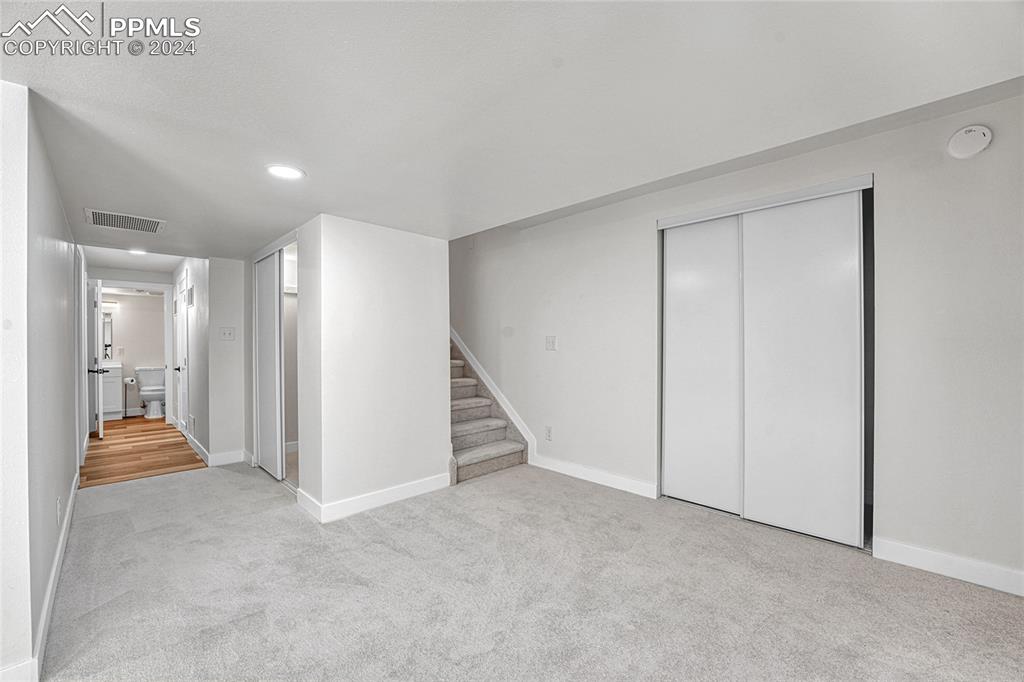 2004 Glenhill Road Colorado Springs, CO 80906 - Photo 37 of 43 a view of an empty room and bedroom