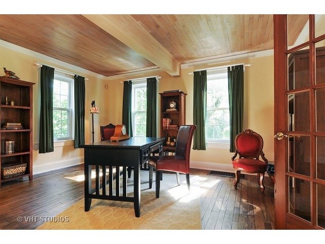 14 West Sunset Road Chicago, IL 60647 - Photo 8 of 25 a dining room with furniture and wooden floor