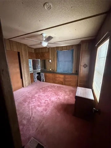 a room with furniture and a window