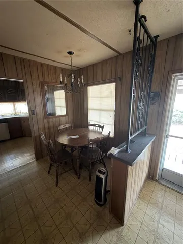 a view of a livingroom with furniture and window