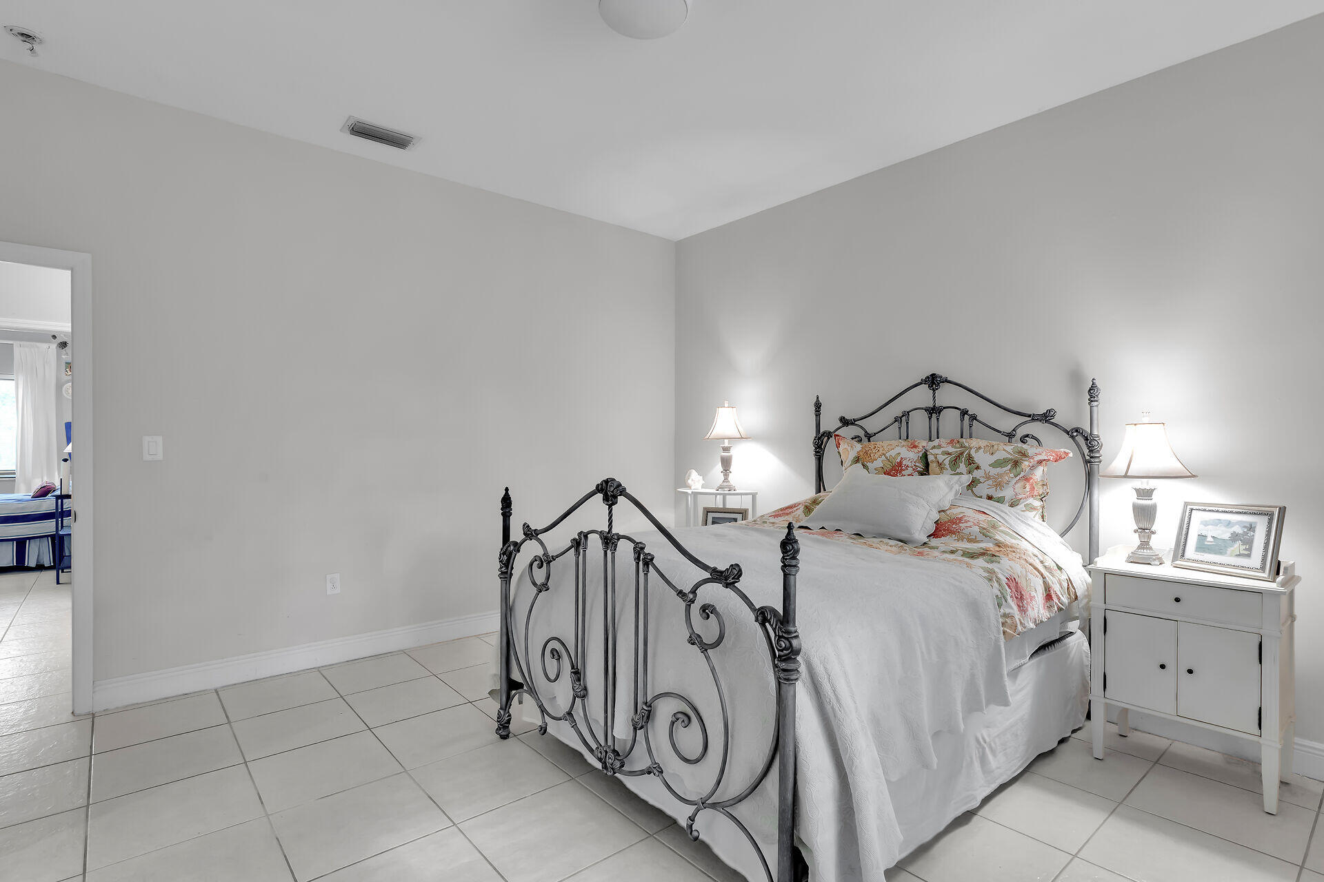 6 Fishermans Trail Key Largo, FL 33037 - Photo 14 of 50 a bed room with a bed and a tv