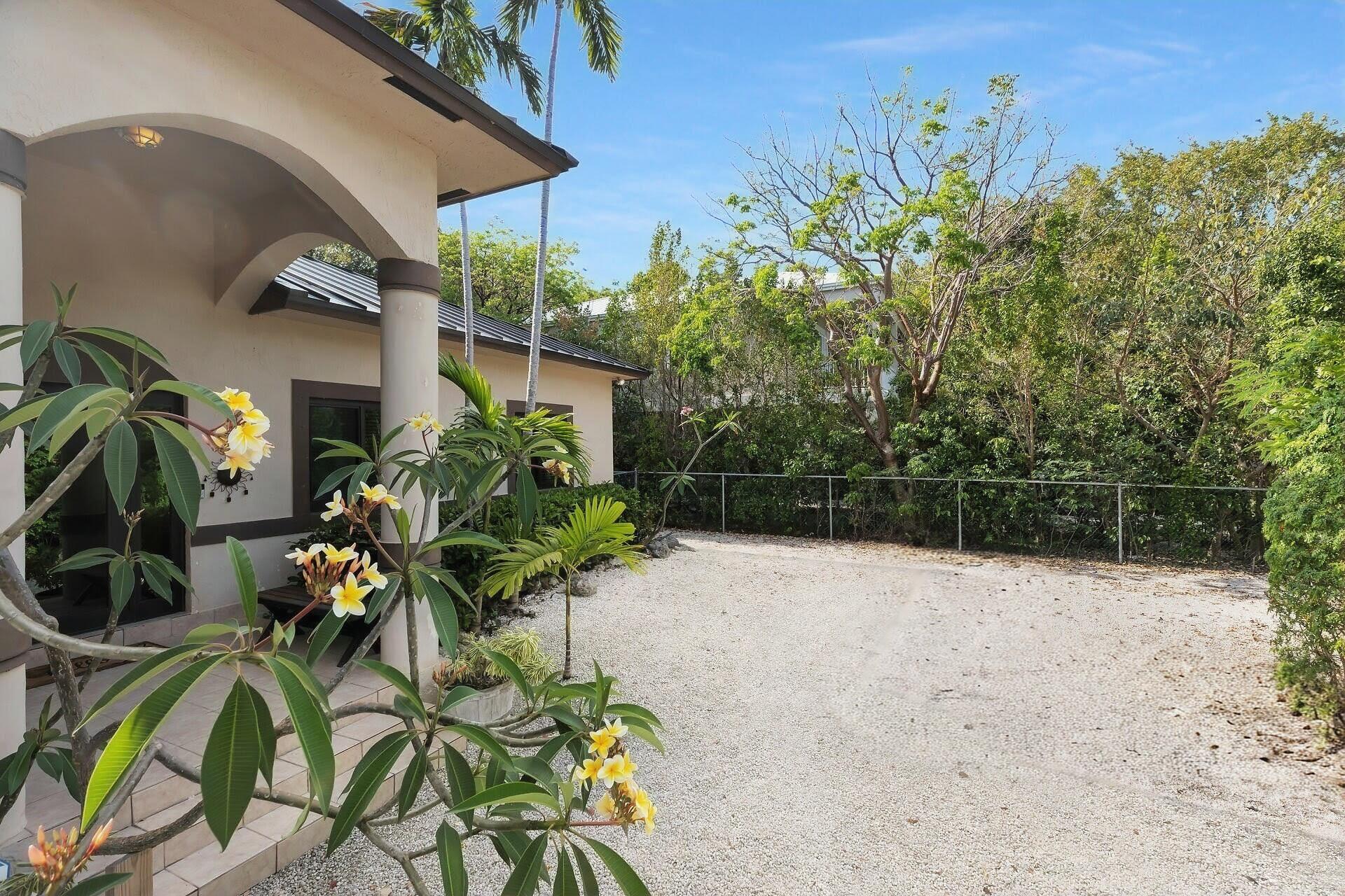 6 Fishermans Trail Key Largo, FL 33037 - Photo 32 of 50 a view of a backyard