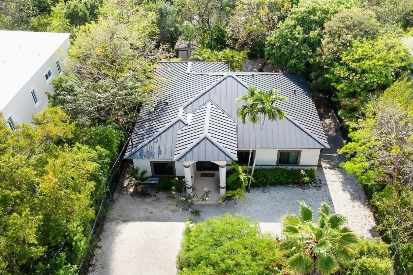 6 Fishermans Trail Key Largo, FL 33037 - Photo 35 of 50 a view of house with outdoor seating and yard