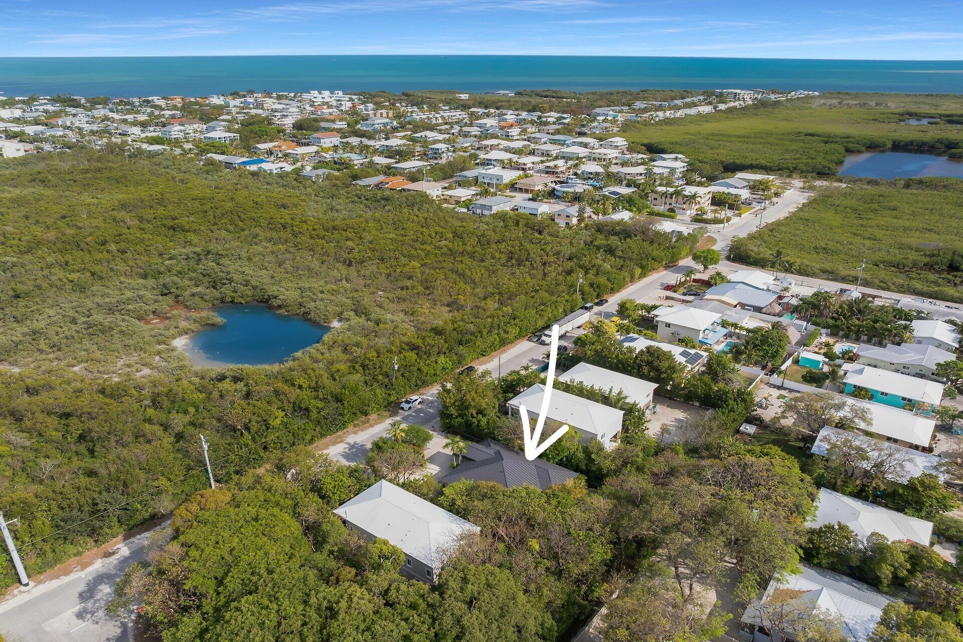6 Fishermans Trail Key Largo, FL 33037 - Photo 40 of 50 an aerial view of residential houses with outdoor space