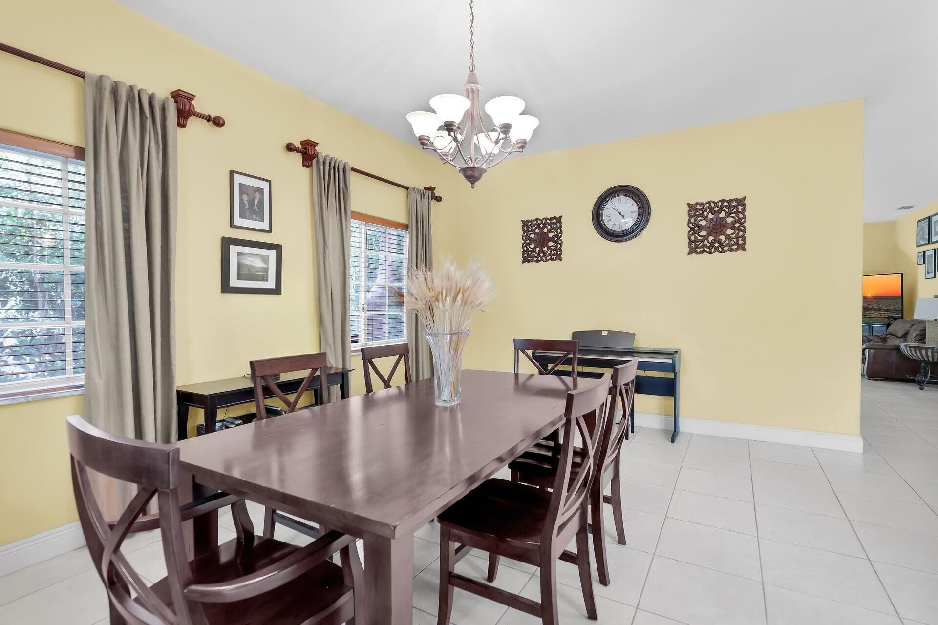 6 Fishermans Trail Key Largo, FL 33037 - Photo 5 of 50 a view of a dining room with furniture and chandelier