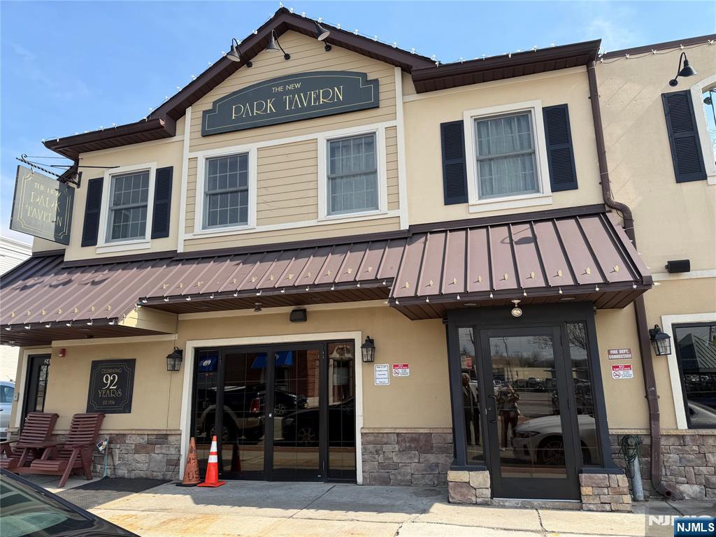 250 Park Avenue, Unit 1 East Rutherford, NJ 07073 - Photo 2 of 8 a view of a brick building with large windows