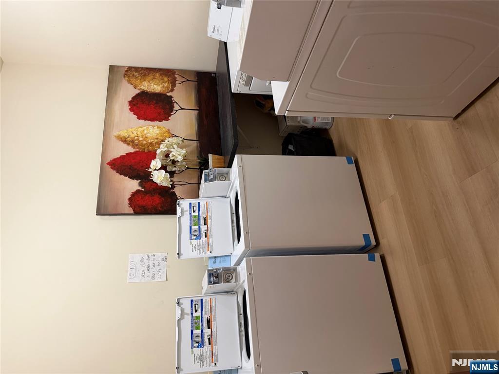 250 Park Avenue, Unit 1 East Rutherford, NJ 07073 - Photo 8 of 8 a utility room with dryer and washer