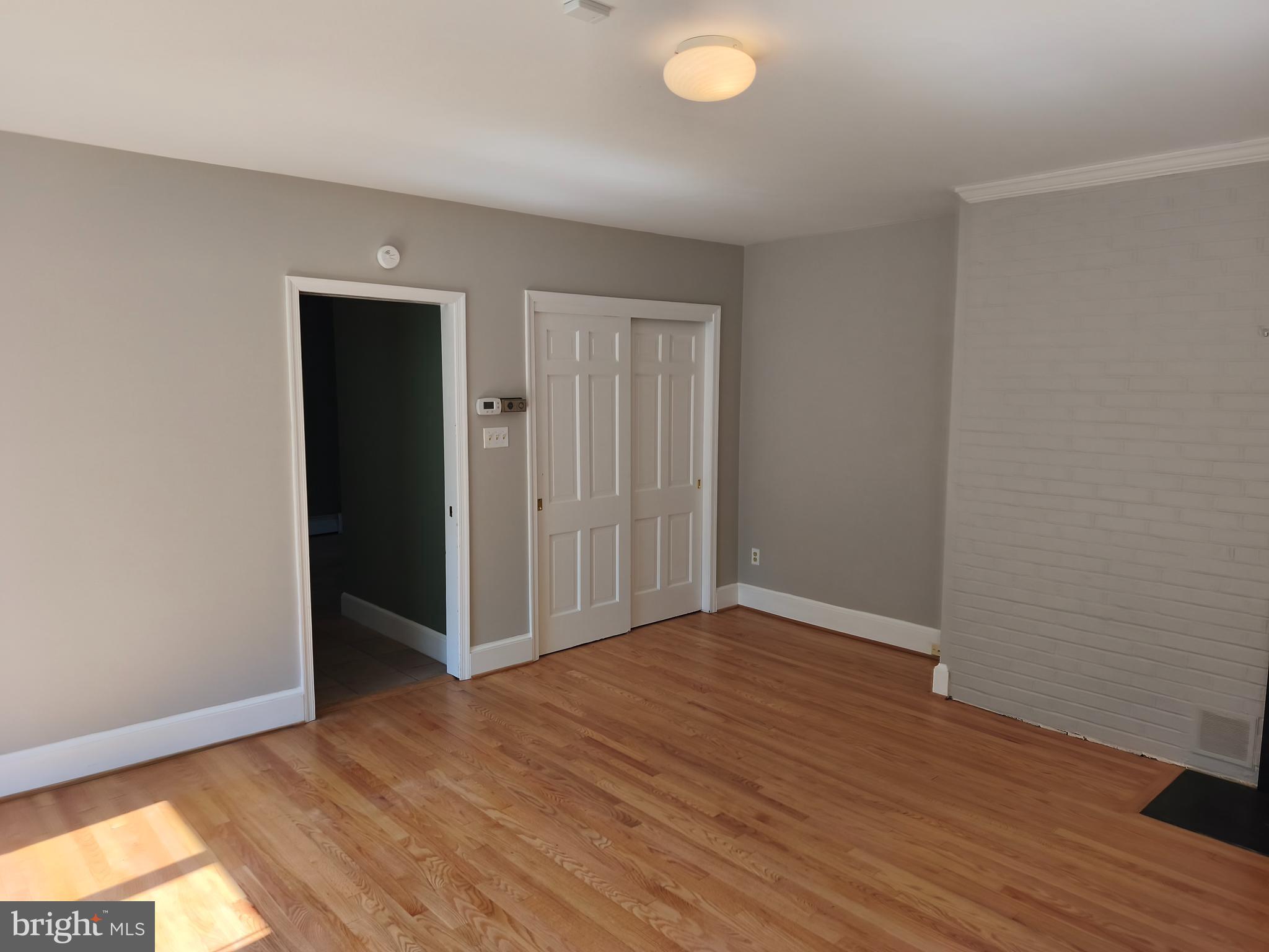 901 Walker Road Great Falls, VA 22066 - Photo 25 of 57 a view of hallway with wooden floor
