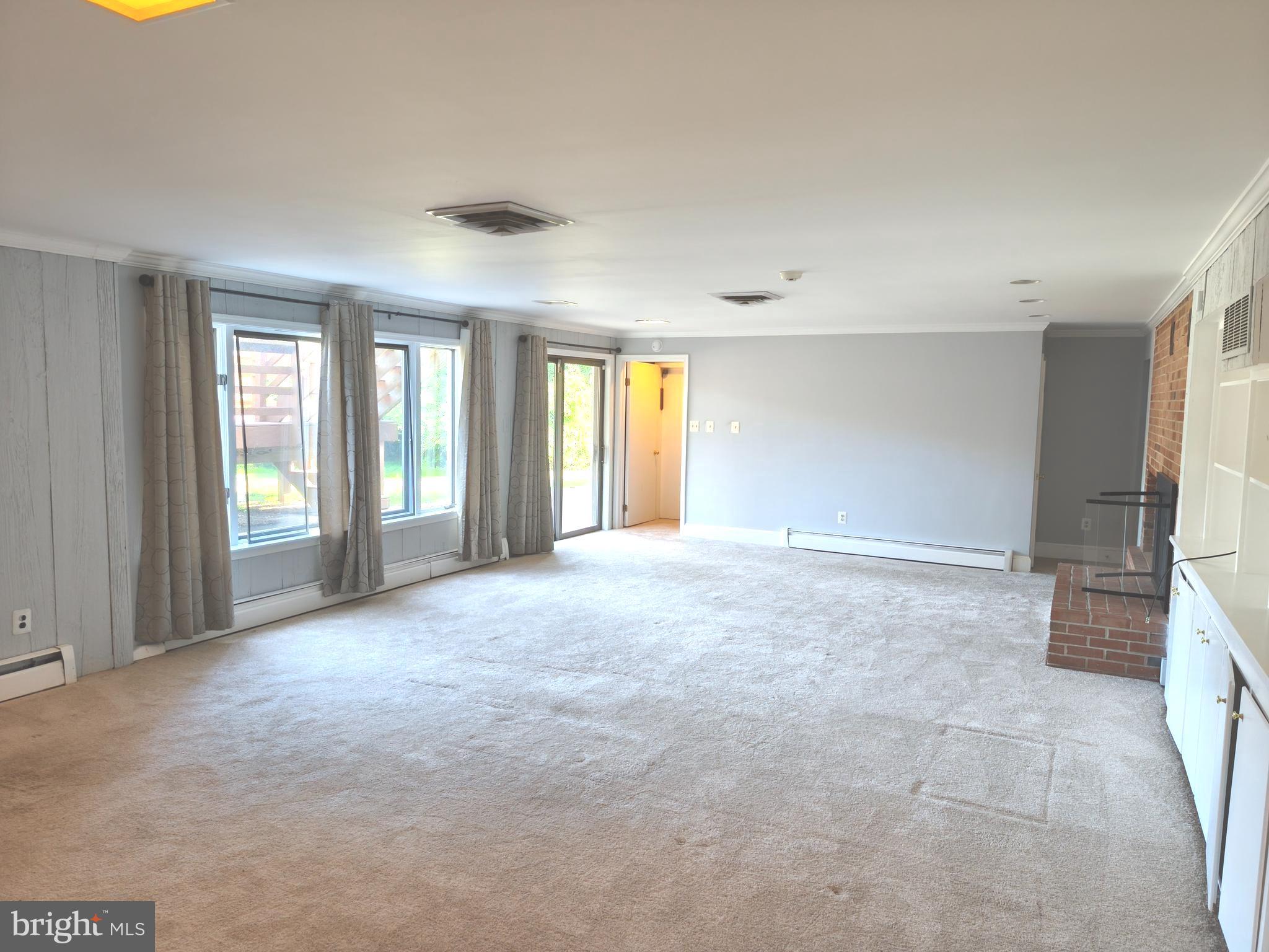 901 Walker Road Great Falls, VA 22066 - Photo 43 of 57 a view of an empty room with a window