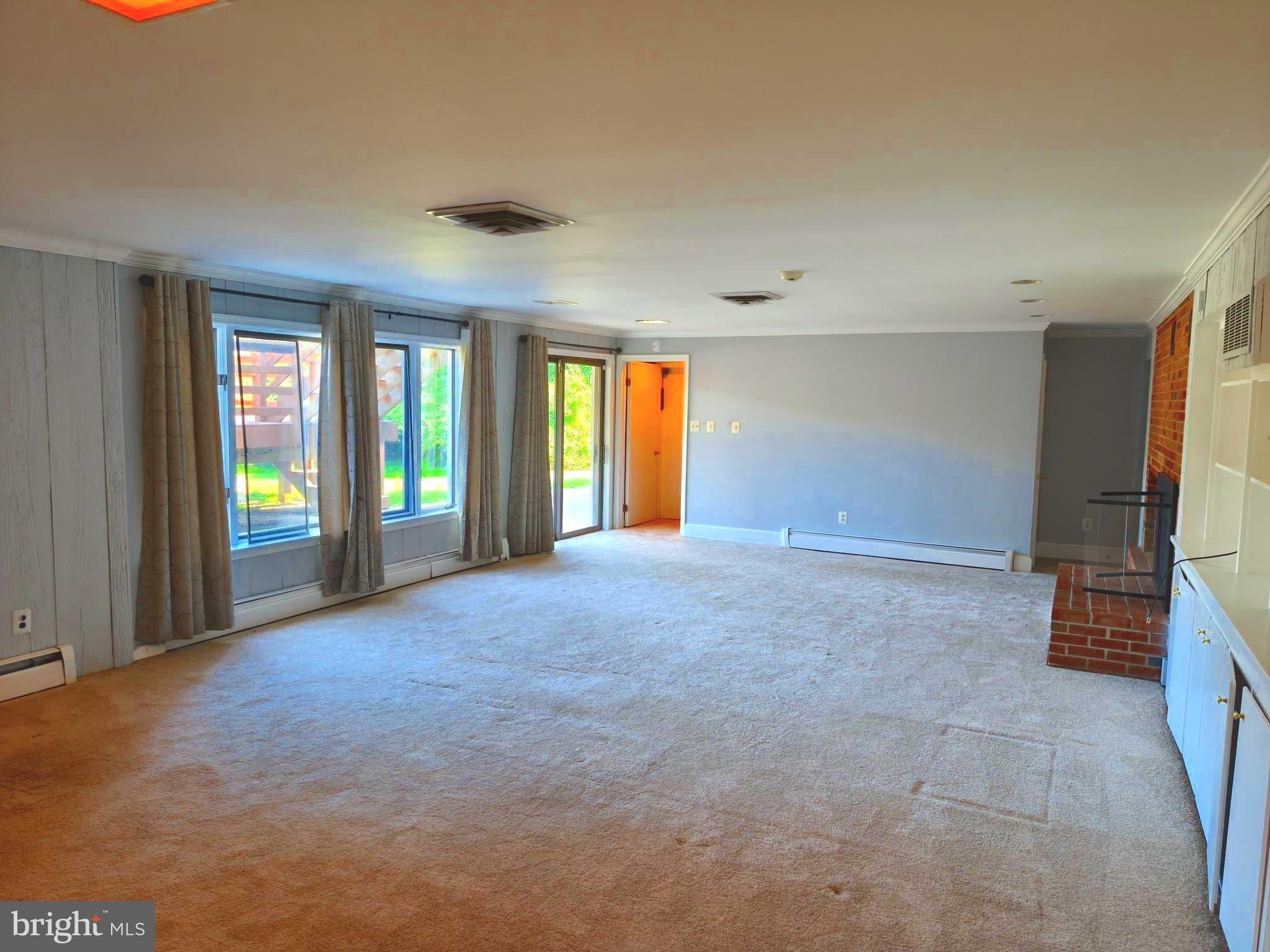 901 Walker Road Great Falls, VA 22066 - Photo 44 of 57 a view of an empty room with a window