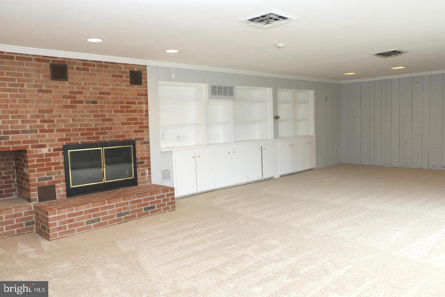 901 Walker Road Great Falls, VA 22066 - Photo 45 of 57 a view of empty room with a fireplace