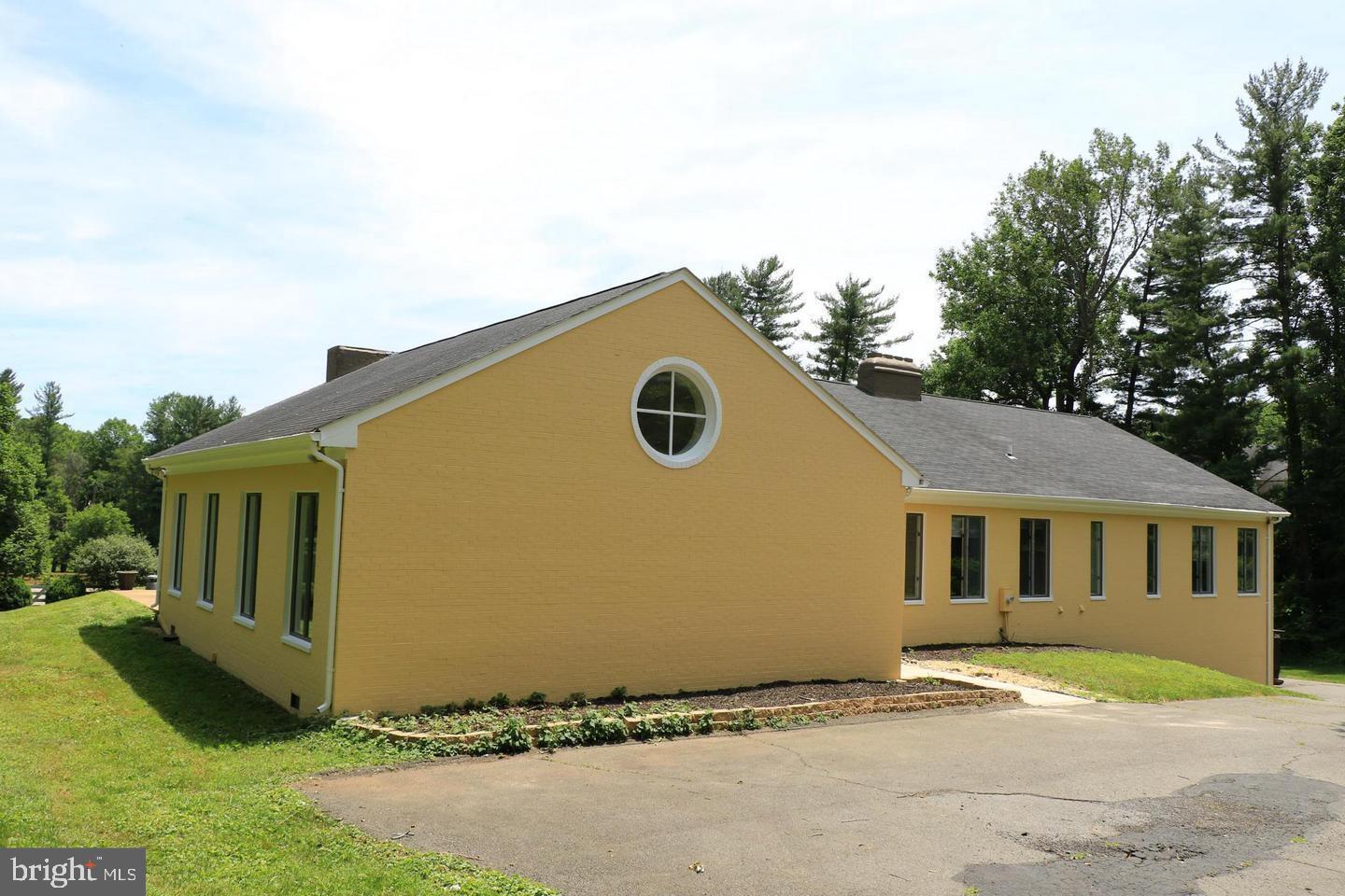 901 Walker Road Great Falls, VA 22066 - Photo 52 of 57 a view of outdoor kitchen and front view of a house