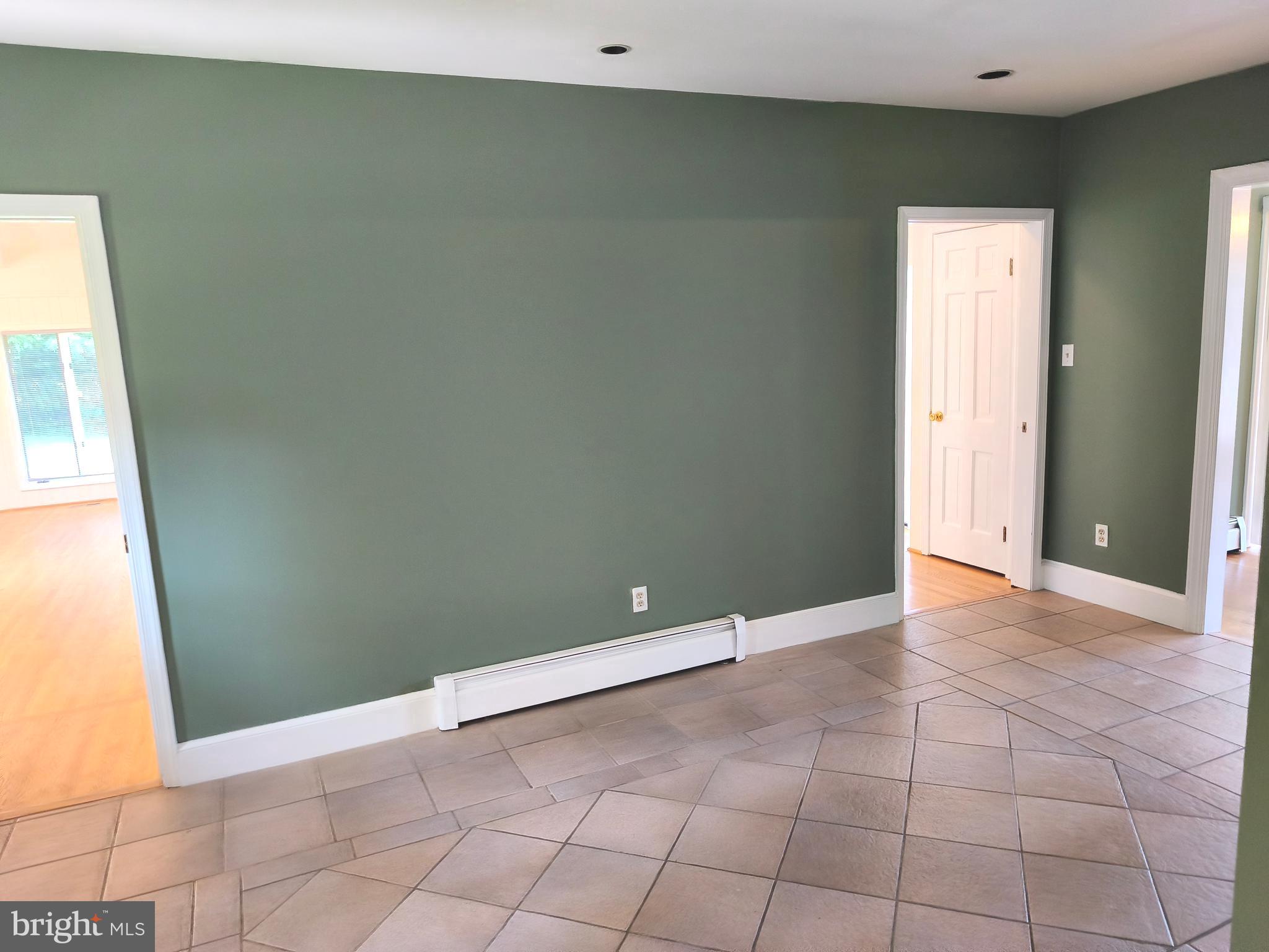 901 Walker Road Great Falls, VA 22066 - Photo 7 of 57 a view of an empty room and window
