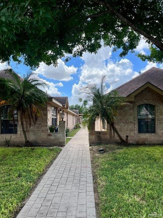 3903 South Radisson Avenue, Unit C Pharr, TX 78577 - Photo 1 of 1 a front view of house with yard and green space