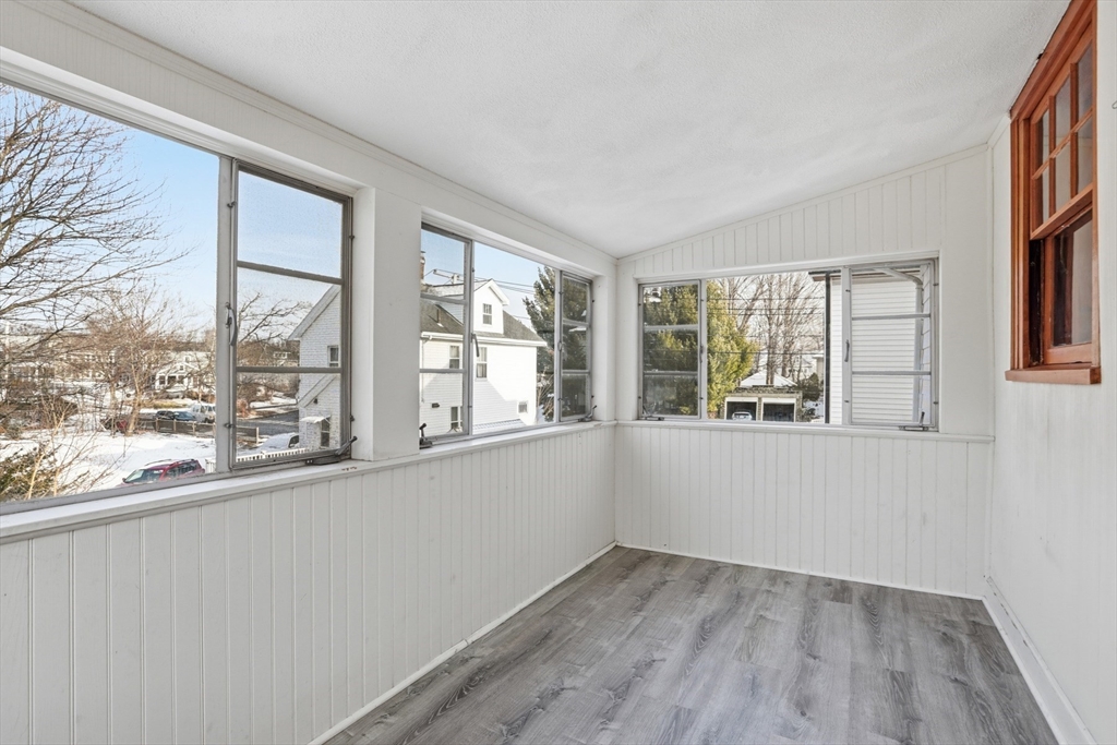 67 Lake Street, Unit 2 Arlington, MA 02474 - Photo 13 of 16 a view of a room that has a window in it