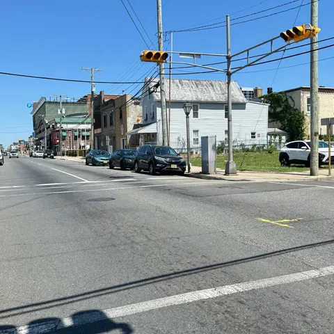 a view of a street with cars