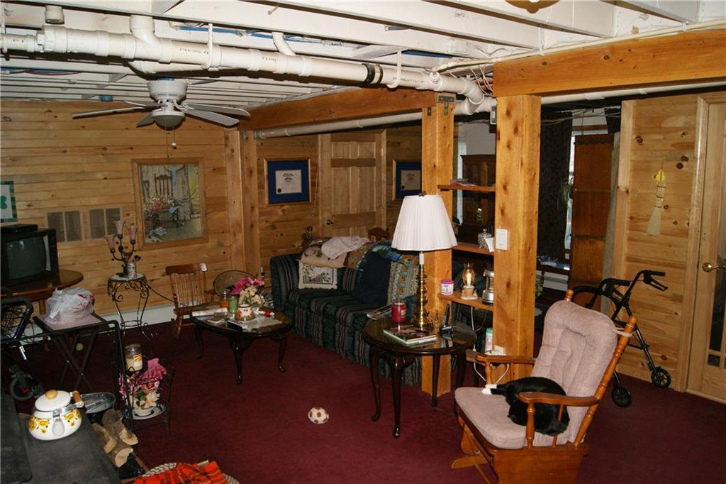 140 Richmond Mills Road Fayette, ME 04349 - Photo 16 of 35 A cozy finished family room in the...