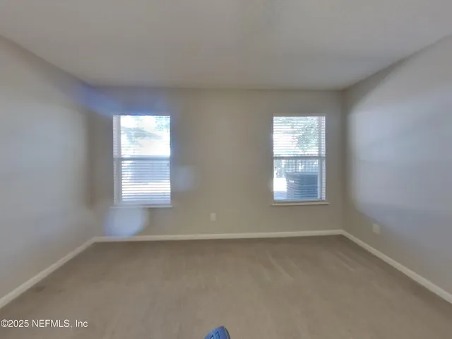 an empty room with a window